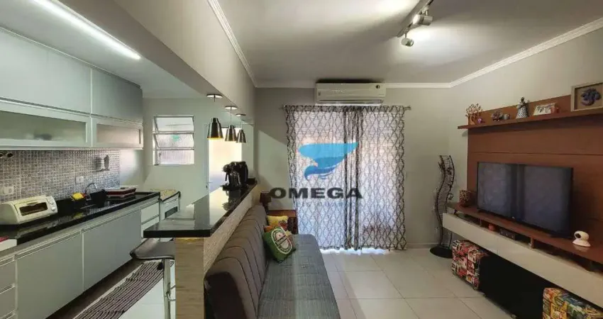 Apartamento à venda na praia do Tombo em Guarujá | Omega Imóveis