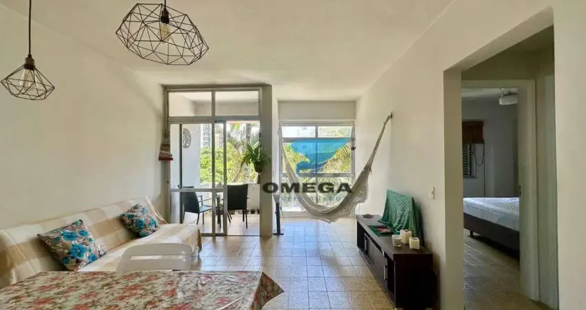 Apartamento à venda na praia do Tombo no Guarujá I Omega Imoveis