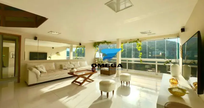 Apartamento beira mar à venda na praia das Pitangueiras no Guarujá I Omega Imoveis