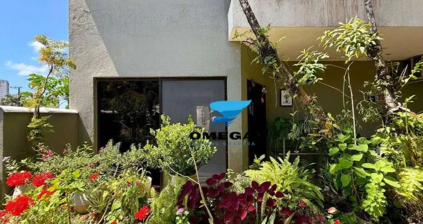 Casa à venda em condomínio fechado na praia das pitangueiras no guarujá i omega imoveis