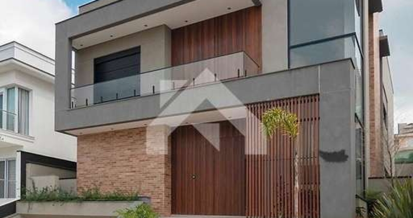 Luxuosa Casa em Alphaville: 4 Suítes e 420m² por R$4,2M