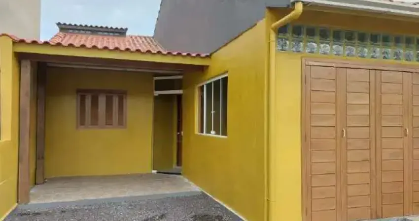 Casa 2 quartos,  2 vagas de garagem e churrasqueira,  Bairro Zona Norte em Capão da Canoa