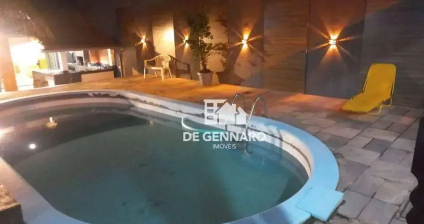 Casa com 4 dormitórios à venda, 100 m² por R$ 850.000 - Maracanã - Praia Grande/SP