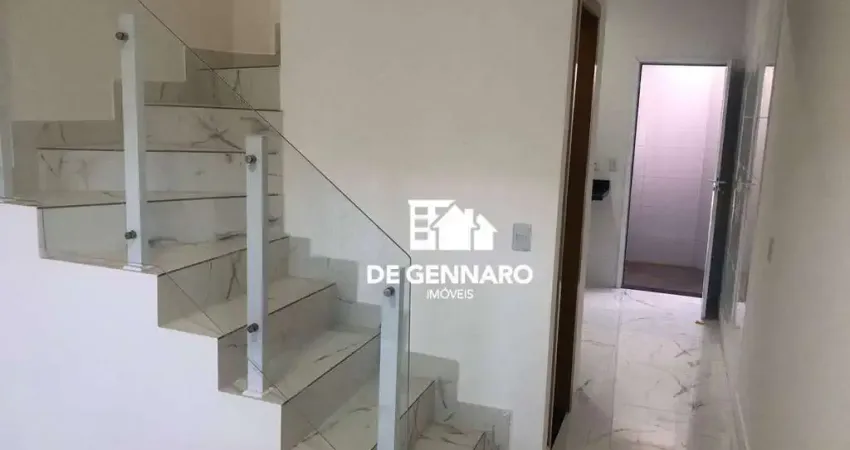 Casa com 2 dormitórios à venda por R$ 370.000 - Maracanã - Praia Grande/SP