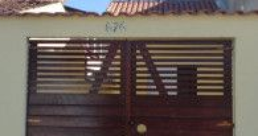 Linda casa localizada no bairro Nova Itanhaém - em rua calçada