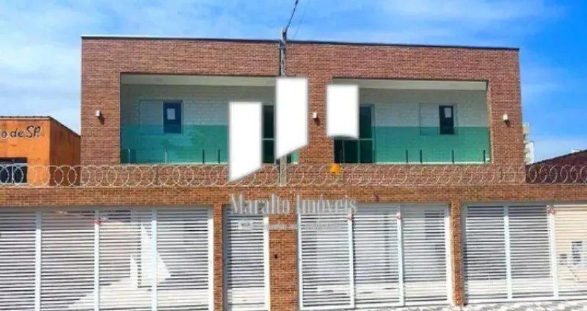 Casa em condominio nova 2 dormitórios de frente com sacada, em praia grande s. paulo..