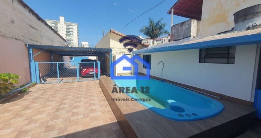 Casa à Venda no Centro com 3 dormitórios, sendo 1 suíte, sala ampla, cozinha, 4 vagas de garagem em