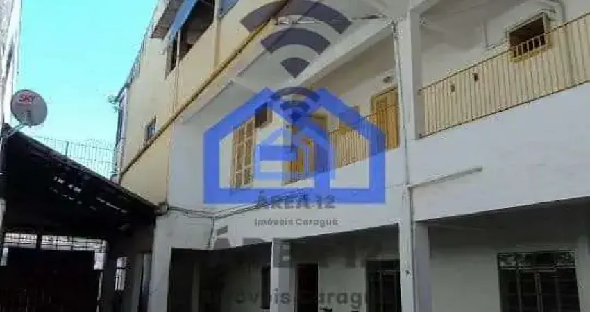 Sobrado triplex à venda no Centro de Caraguatatuba, SP - 5 dormitórios, sendo 2 suítes, 5 banheiros