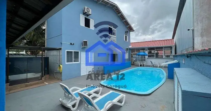 Casa à Venda no bairro Praia das Palmeiras com 3 dormitórios, sendo 1 suíte, banheiro e sala - Cara