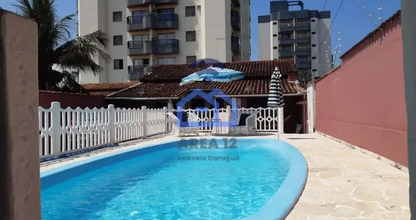 Casa à venda no bairro Martim de Sá - 3 dormitórios com ar condicionado, 3 banheiros, cozinha, área