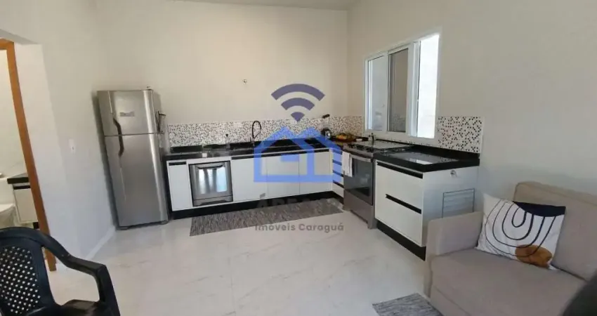 Área comercial com casa à venda no bairro Capricórnio II em Caraguatatuba, SP - terreno com 650m² m