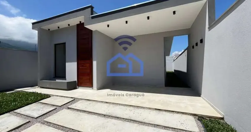 Casa à venda no bairro do Massaguaçu em Caraguatatuba, SP - 3 dormitórios, sendo 1 suíte, área gour