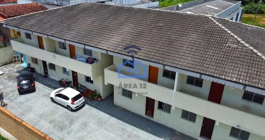 Casa em condomínio para locação no bairro Jardim das Palmeiras em Caraguatatuba, SP - Conforto e pr