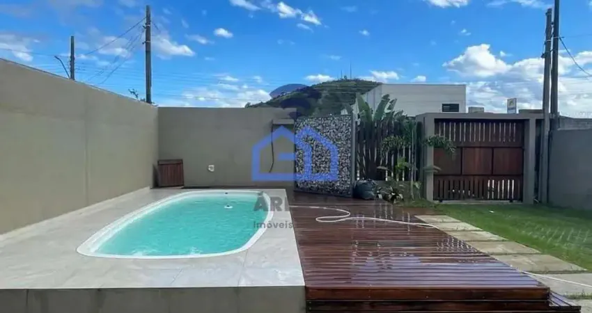 Casa com piscina à venda no bairro Cidade Jardim em Caraguatatuba, SP - Viva com conforto e comodid