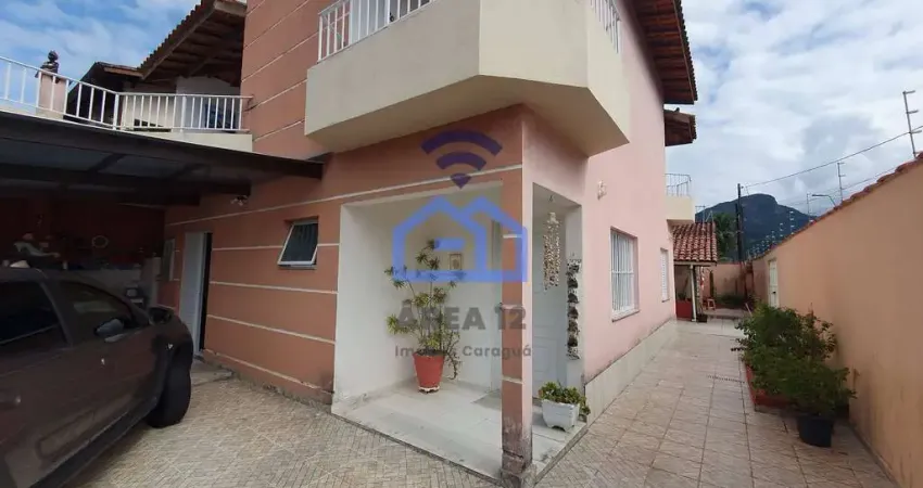 Sobrado com 4 suítes à venda no bairro do Indaiá em Caraguatatuba, SP - Com edícula!