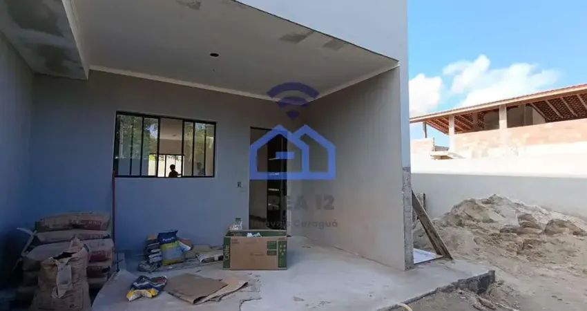 Sobrado geminado em construção à venda no bairro Massaguaçu em Caraguatatuba, SP com 02 suítes, 02