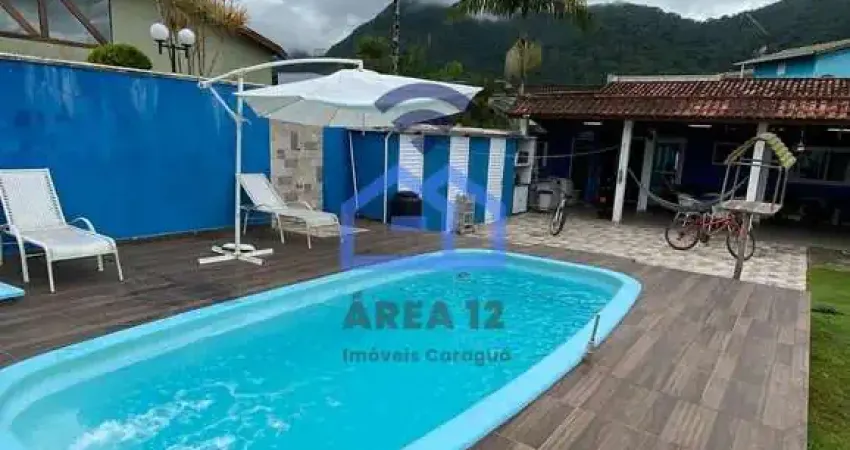 Casa com piscina à venda no condomínio Mar Verde, bairro da Tabatinga em Caraguatatuba, SP