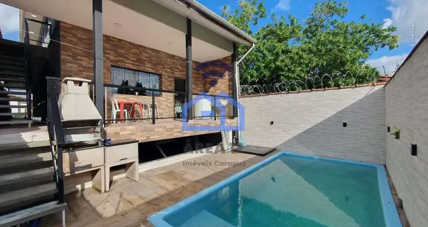 Sobrado à venda no bairro do Aruan em Caraguatatuba, SP - Com 7 dormitórios e piscina!
