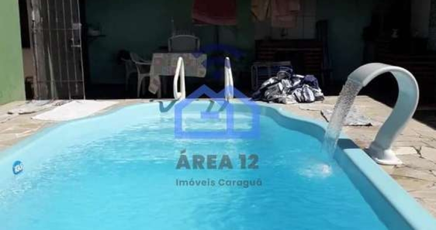 Casa com piscina à venda no bairro do Perequê Mirim em Caraguatatuba, SP