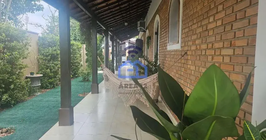 Casa à venda com 5 dormitórios sendo 3 suítes, piscina e área gourmet no bairro caputera em caragua