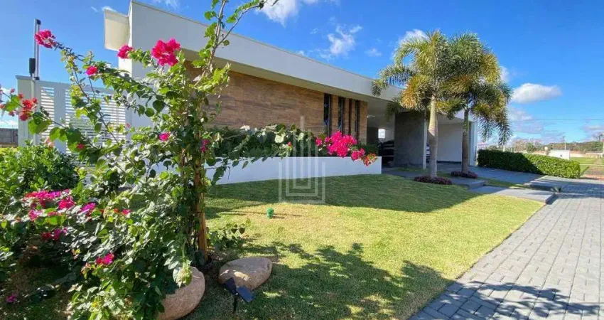 Casa térrea à venda no condomínio reserva iguaçu em foz do iguaçu.