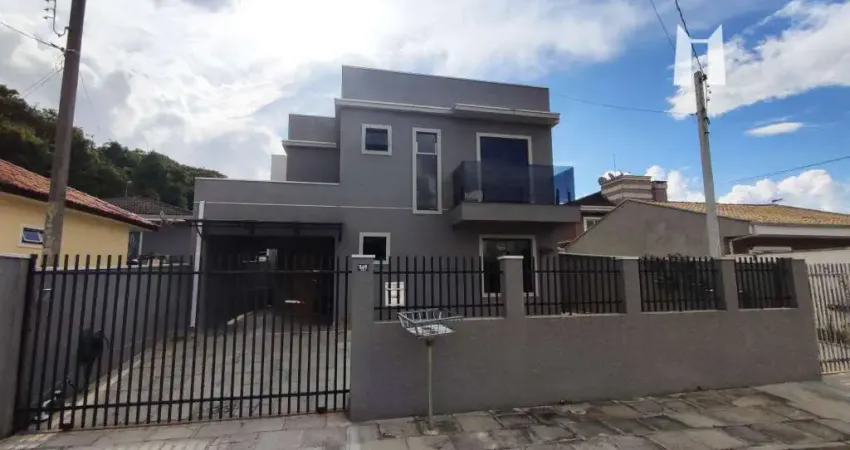 Sobrado com 3 dormitórios para alugar, 115 m² por R$ 2.913,35/mês - Jardim Busmayer - Campo Largo/PR