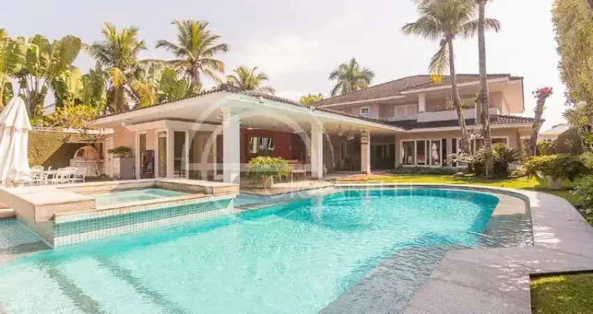Mansão de luxo no condomínio malibu barra da tijuca, 994 m², 5 suítes, salão em 4 ambientes, área de lazer completa e adega climatizada.