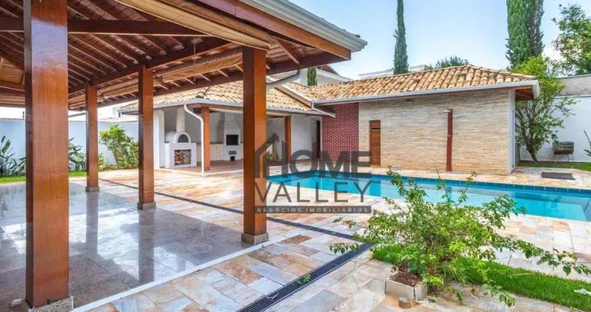 Casa com 4 suítes, área de lazer, 455,42m² construídos, localizada no residencial vila verde, campinas.