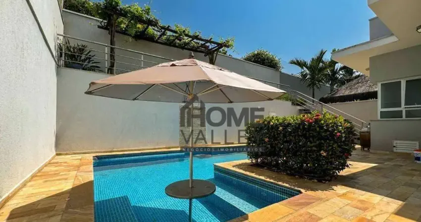 Lindíssima casa com 4 quartos, todos suítes, escritório, piscina, 317m² construídos, à venda no Condomínio Terras do Caribe, Valinhos.
