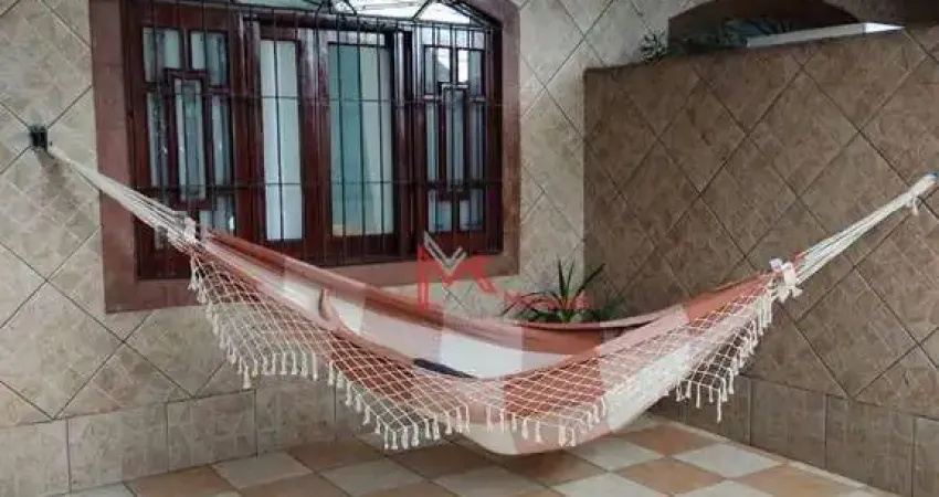 Casa Geminada com Churrasqueira e  com 2 dormitórios, sendo 1 suíte  à venda, 127 m² por R$ 520.000 - Tupi - Praia Grande/SP