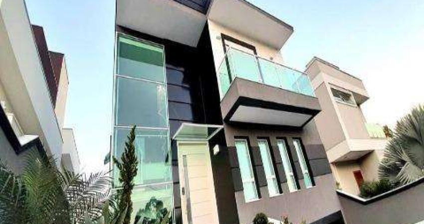 VENDA DE CASA CONDOMÍNIO REAL PARK ARUJÁ COM A/T 300m² e A/C 385m² São 4 dormitórios, sendo 3 suítes. CONSULTE-NOS.