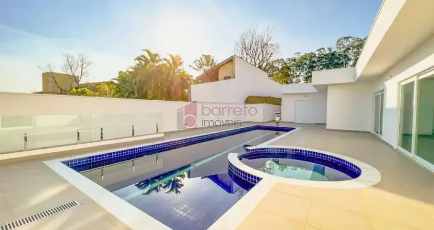 Casa térrea com 4 suítes à venda no condomínio estância marambaia em vinhedo/sp