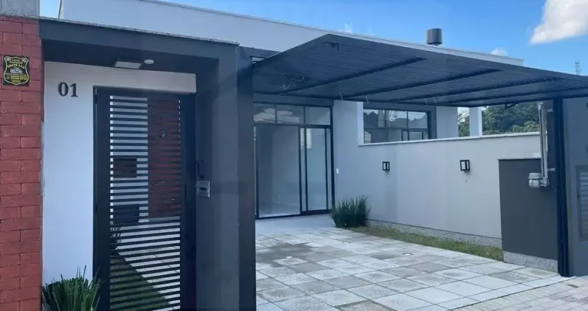 CASA BAIXA DE 105m² COM TRÊS DORMITÓRIOS SENDO UMA SUÍTE