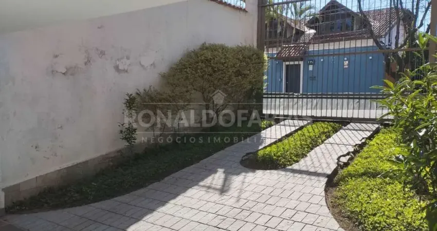 Sobrado  venda sendo 4 dormitorio com suite , sala ampla , escritorio , piscina churasqueira .