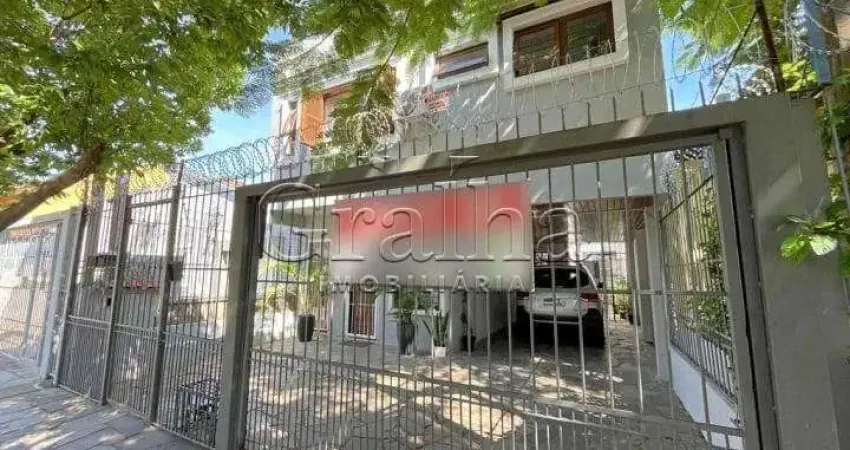Casa com 4 quartos à venda na Rua Coronel Jaime da Costa Pereira, 376, Partenon, Porto Alegre