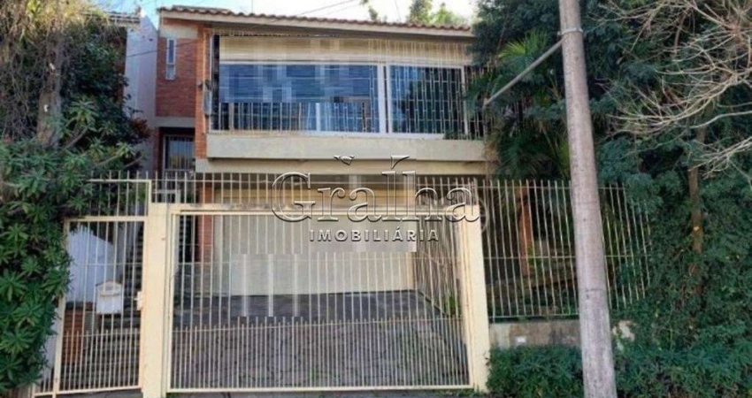 Casa com 4 quartos à venda na Rua Antônio Ribeiro, 321, Santo Antônio, Porto Alegre