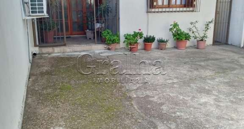 Casa com 3 quartos à venda na Rua Honório Lemos, 354, Partenon, Porto Alegre