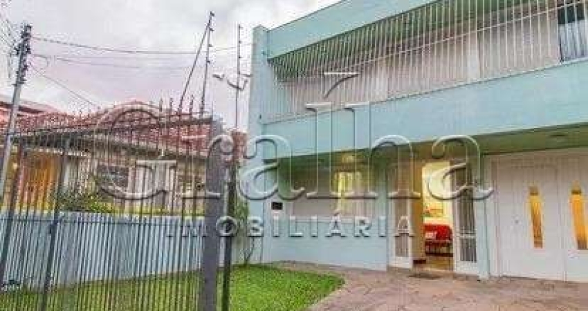 Casa com 3 quartos à venda na Rua Fagundes Varela, 83, Santo Antônio, Porto Alegre