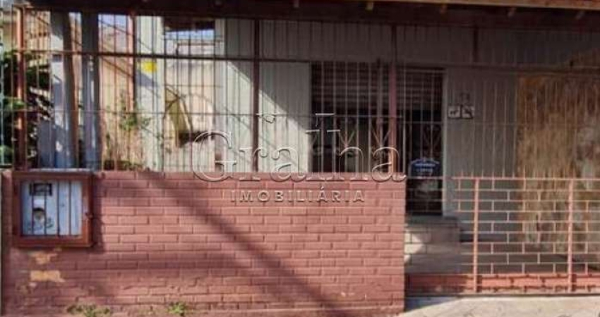 Casa com 4 quartos à venda na Rua Euclydes da Cunha, 71, Partenon, Porto Alegre