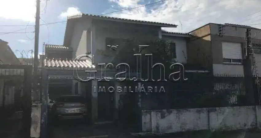 Casa com 5 quartos à venda na Rua Coronel Jaime da Costa Pereira, 318, Partenon, Porto Alegre