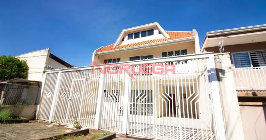 Imperdível casa com 5 quartos e 2 suítes no capão raso, curitiba-pr: 2 salas, 3 banheiros, 2 vagas e 300m²!