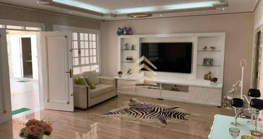 Casa com 4 dormitórios à venda, 336 m² por R$ 1.700.000,00 - Vila Assunção - Praia Grande/SP