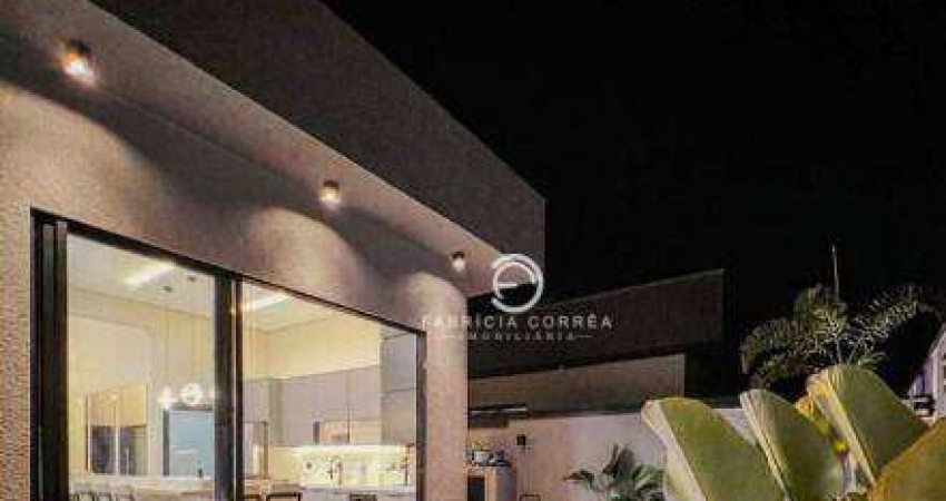 Casa com 3 dormitórios à venda, 210 m² por R$ 1.850.000,00 - Condomínio Ouro Ville - Taubaté/SP