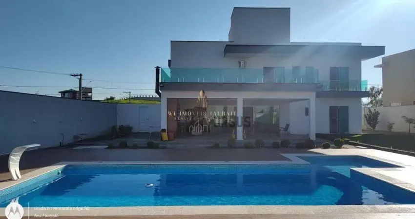 Sobrado com 4 dormitórios à venda, 462 m² por R$ 2.200.000,00 - Condomínio Village da Serra - Tremembé/SP