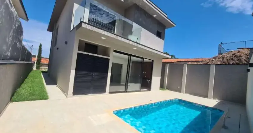 Casa nova com 3 suítes, piscina, área gourmet no Condomínio Arco Iris em Atibaia SP.