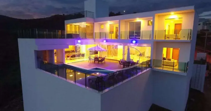 Magnifico sobrado para venda em Escarpas do Lago, linda vista, 5 suites, ampla varanda gourmet, piscina borda infinita e heliponto em 781 m2