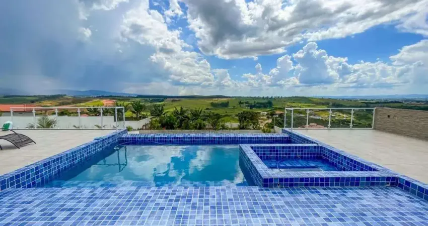Maravilhosa casa alto padrão com piscina de borda infinita com vista para serra da mantiqueira