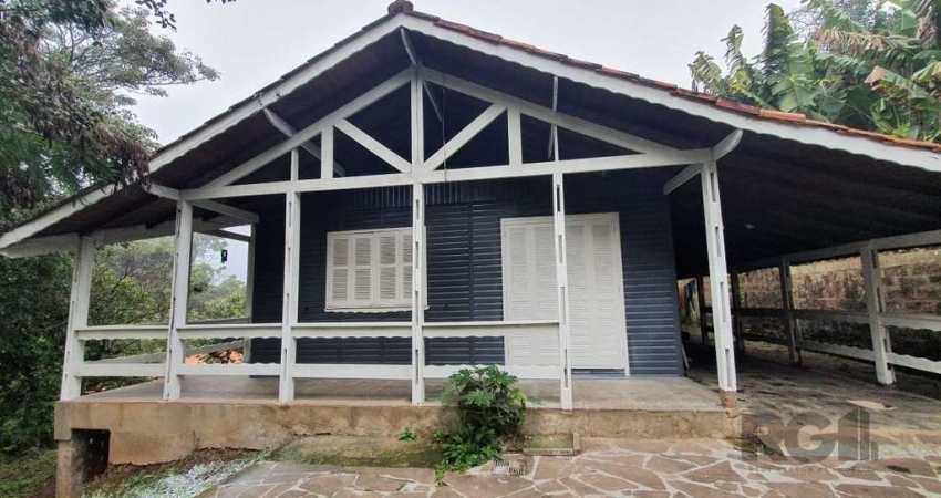 Casa com 2 quartos à venda na Rua Flor de Jacarandá, 77, Vila Nova, Porto Alegre