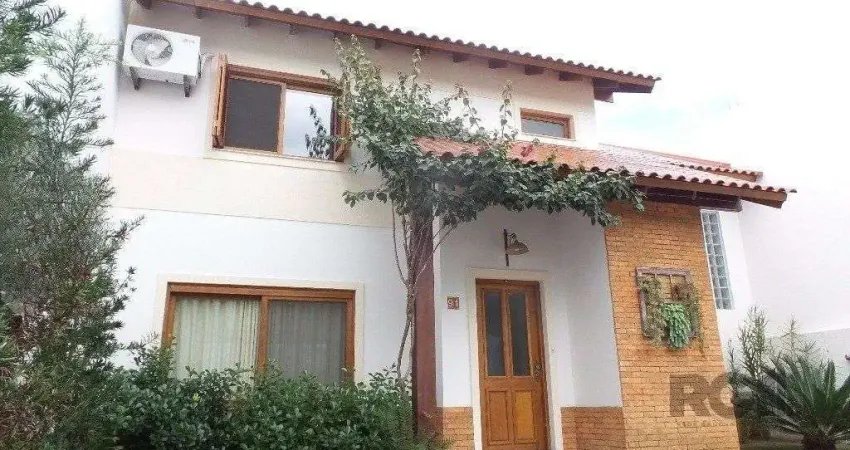 Excelente casa em condomínio com 3 dormitórios e 4 vagas.