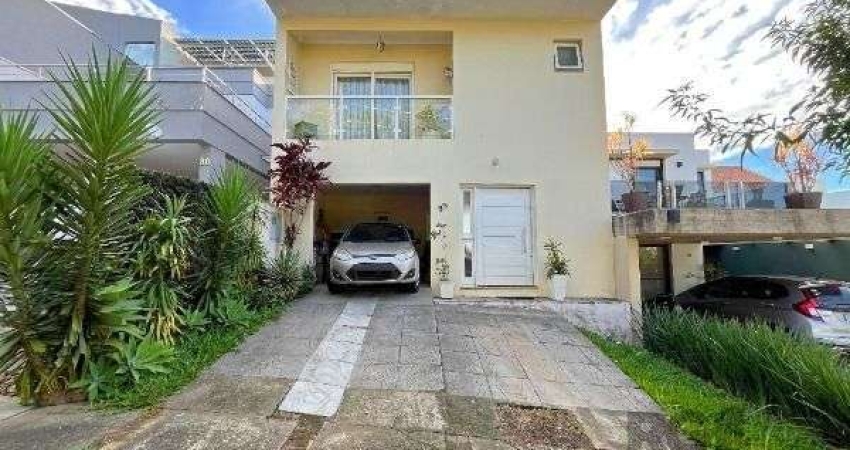 Casa Condominio em Porto Alegre, no bairro Vila Nova, com 3 dormitório(s), e 3 banheiros, à venda.